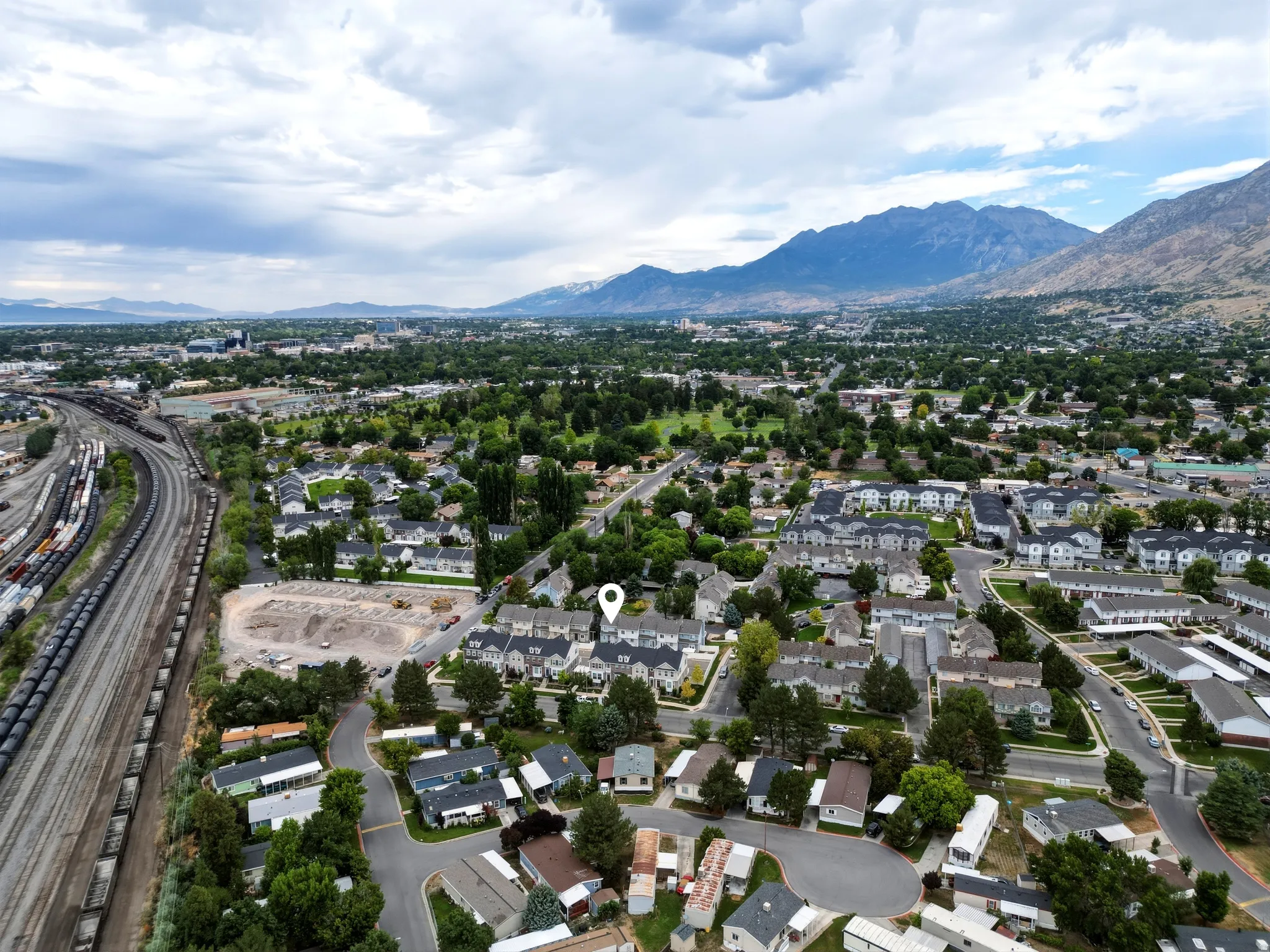Aerial perspective showcasing a residential area with varied housing types