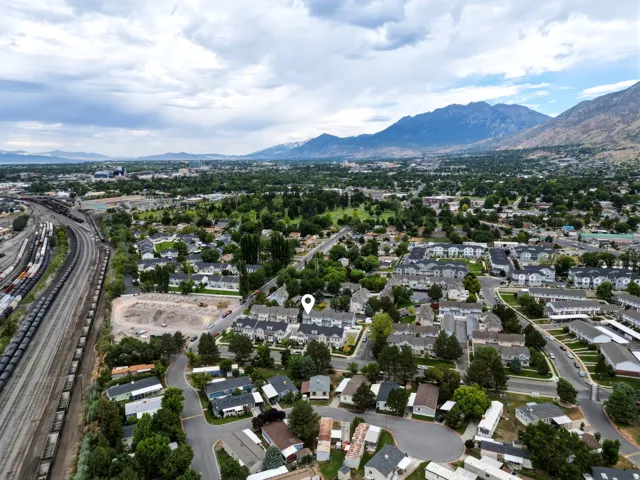 Aerial perspective showcasing a residential area with varied housing types