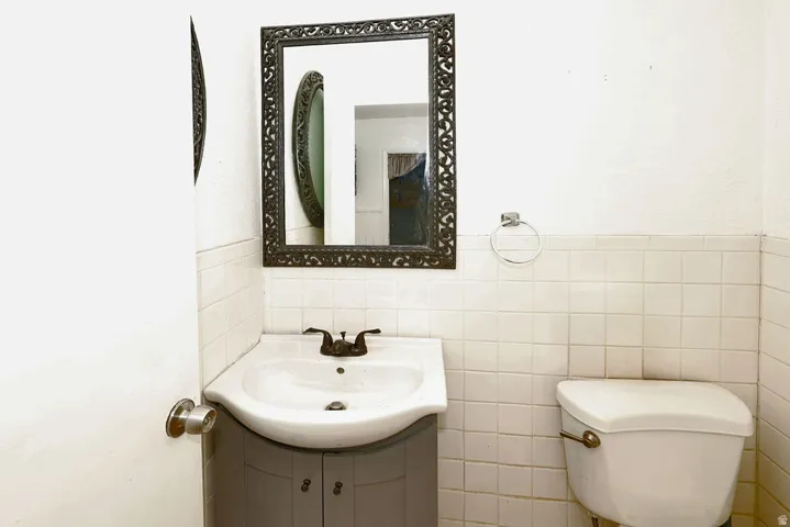 White subway tile wainscoting