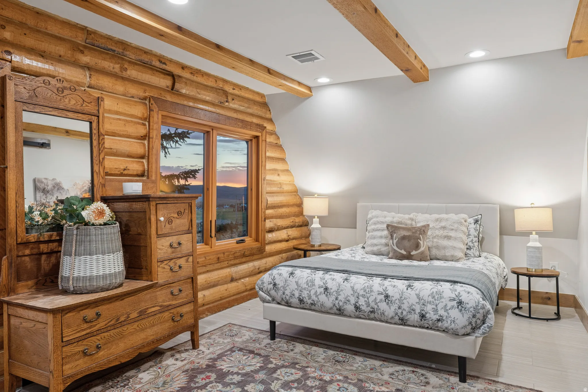 Exposed wood beam ceiling with recessed lighting