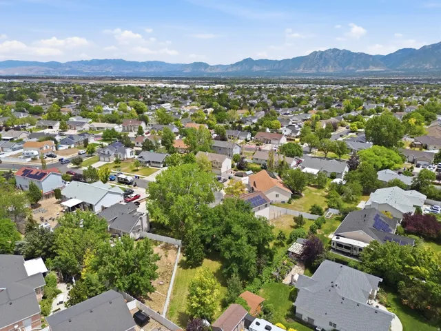 Residential neighborhood with a backdrop of distant mountains