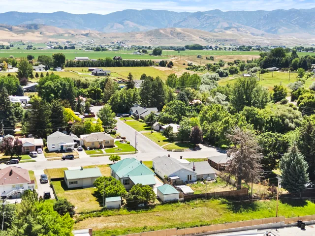 Aerial perspective showcasing a residential neighborhood with varied housing styles