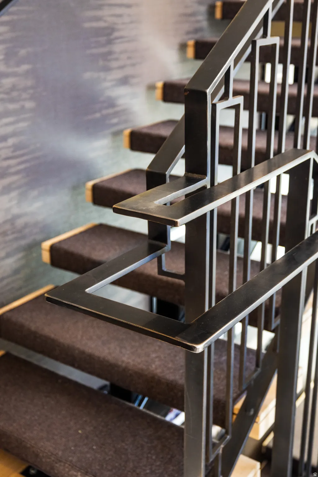 Custom metal handrail with geometric design