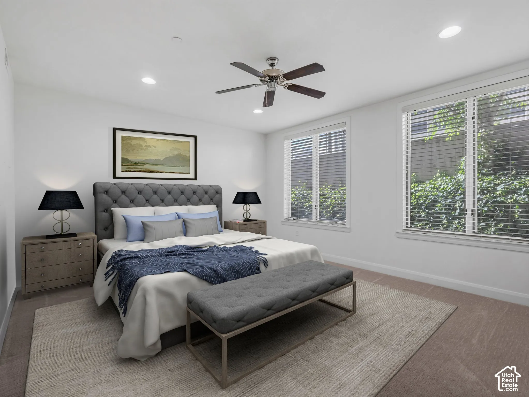 Bedroom featuring recessed lighting, a ceiling fan, and two windows with blinds