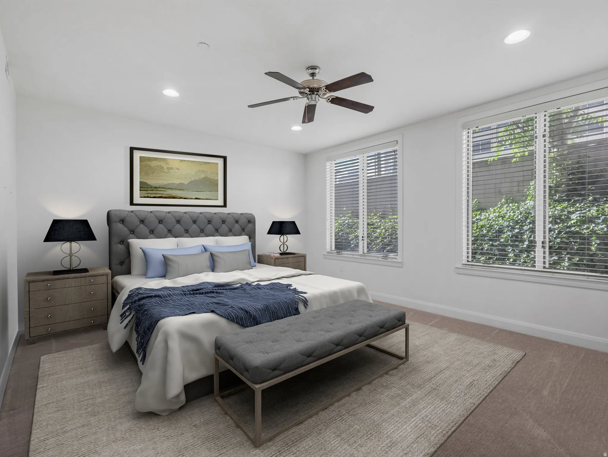 Bedroom featuring recessed lighting, a ceiling fan, and two windows with blinds