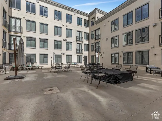 Expansive courtyard featuring stamped concrete flooring