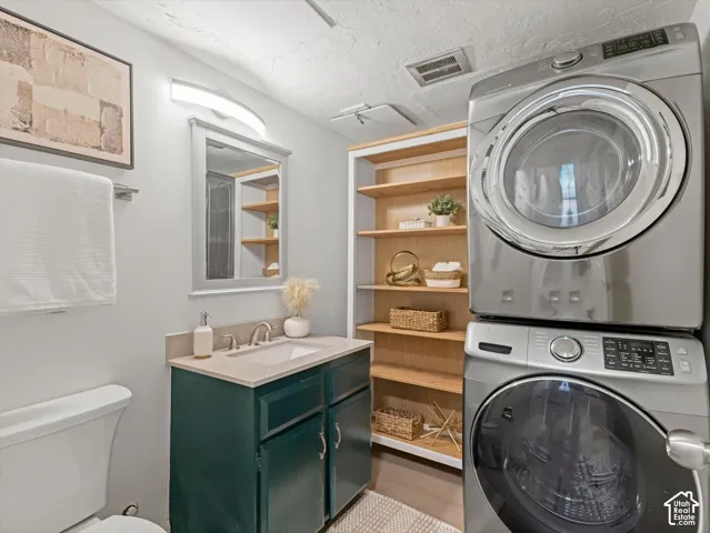 Modern vanity with a rectangular sink, integrated countertop, and brushed nickel faucet