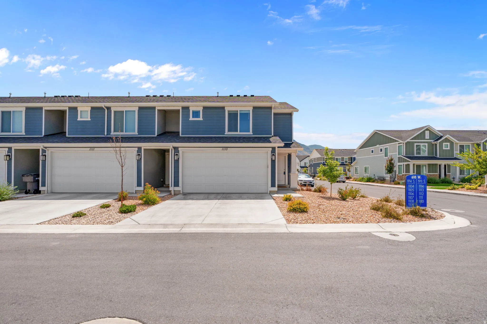 2 Story Townhome. End Unit. Lovely blue hardyboard siding. Porch. Front door and back entrnaces! Lots of parking, including in the driveway. 2 car garage.