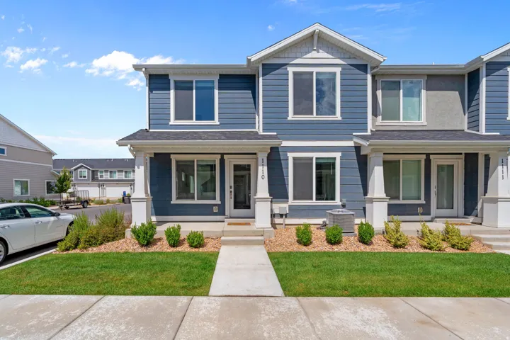 2 Story Townhome. End Unit. Lovely blue hardyboard siding. Porch. Front door and back entrnaces! Lots of parking, including in the driveway. 2 car garage.