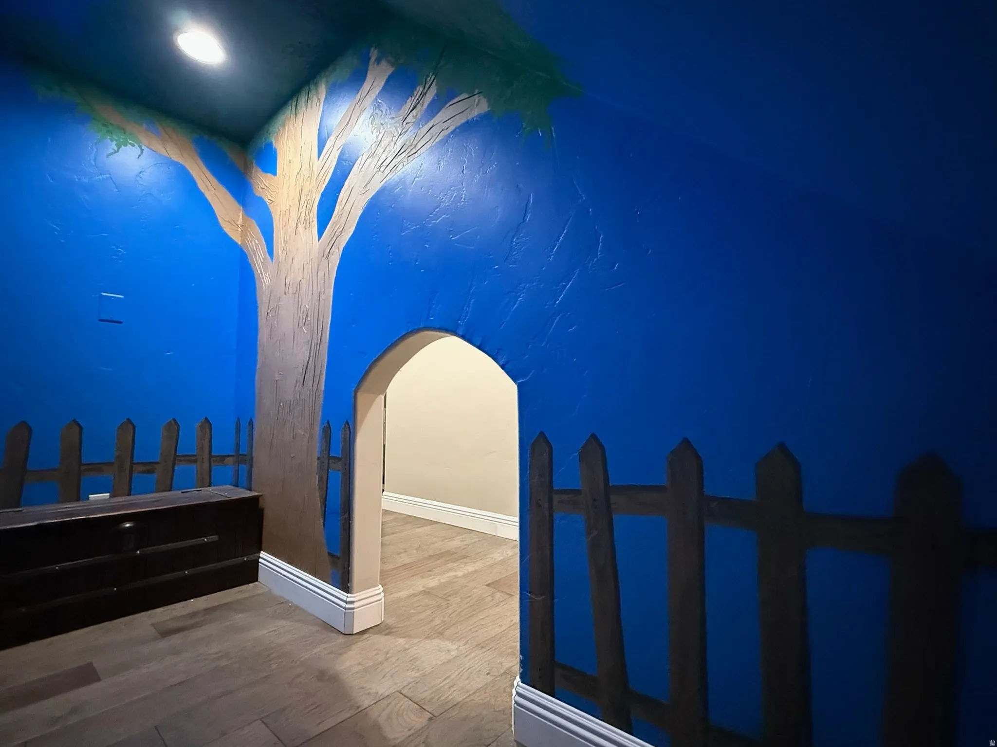 kids play area- under the stairs in basement.