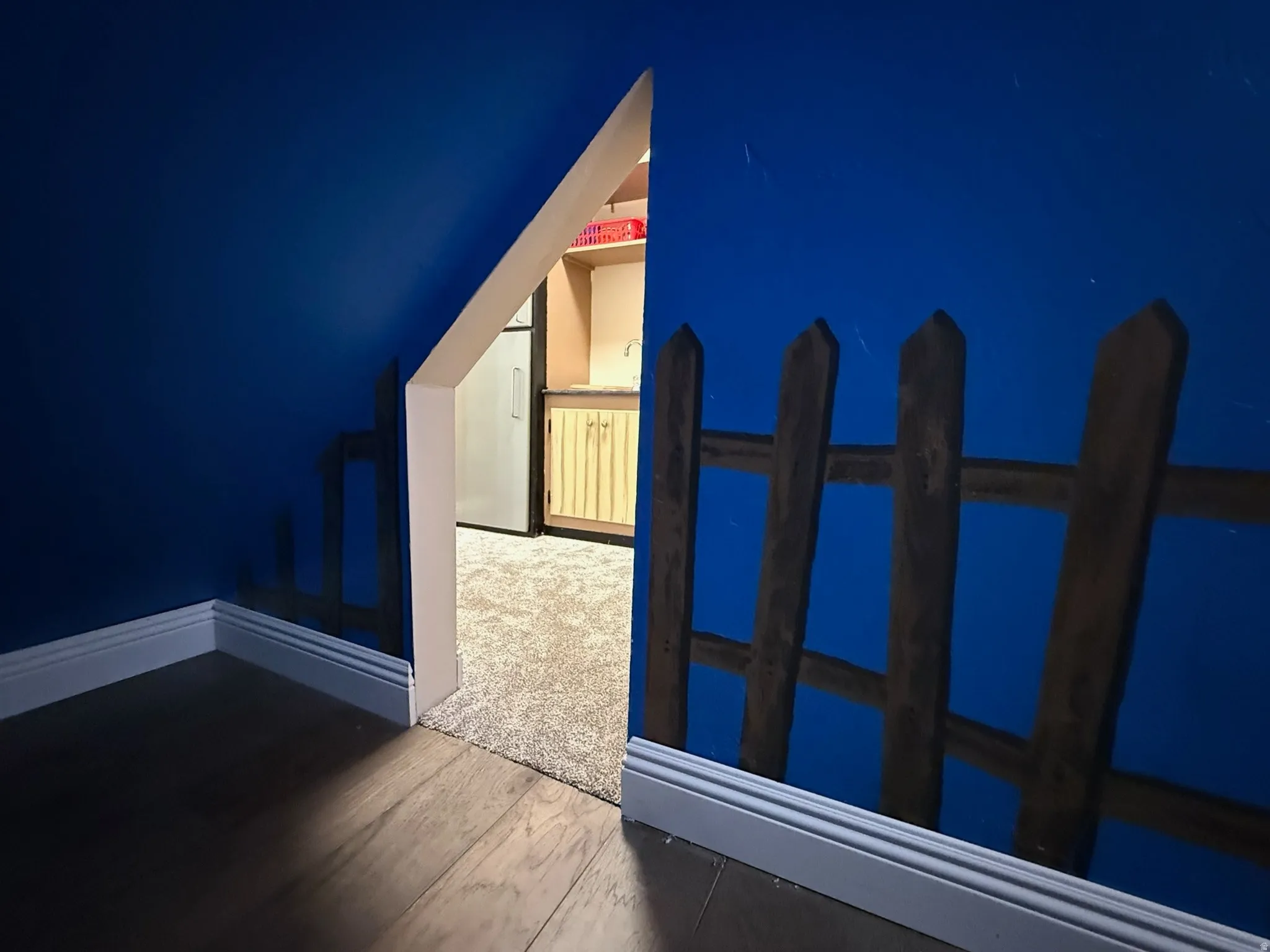 kids play area under the stairs