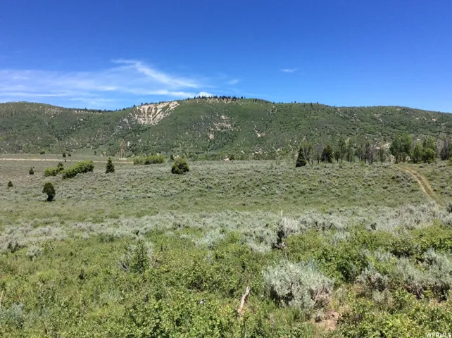 Off Alta Dr looking to Quaking Aspen location and moutnain backdrop.