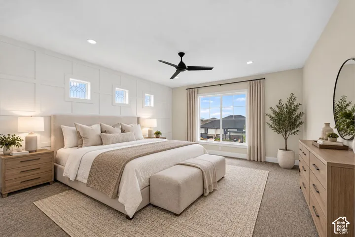 White wainscoting wall paneling, recessed lighting, and a contemporary ceiling fan