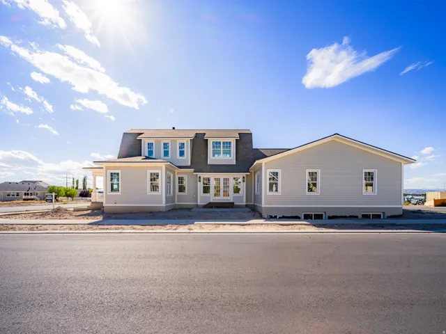Light gray siding exterior with white trim