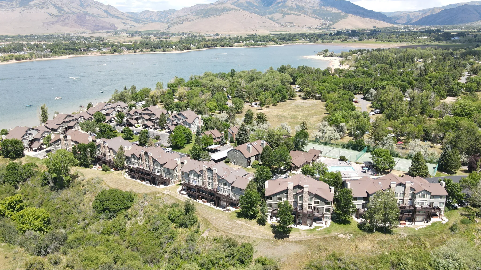 Waterfront community featuring multi-story residences with balconies