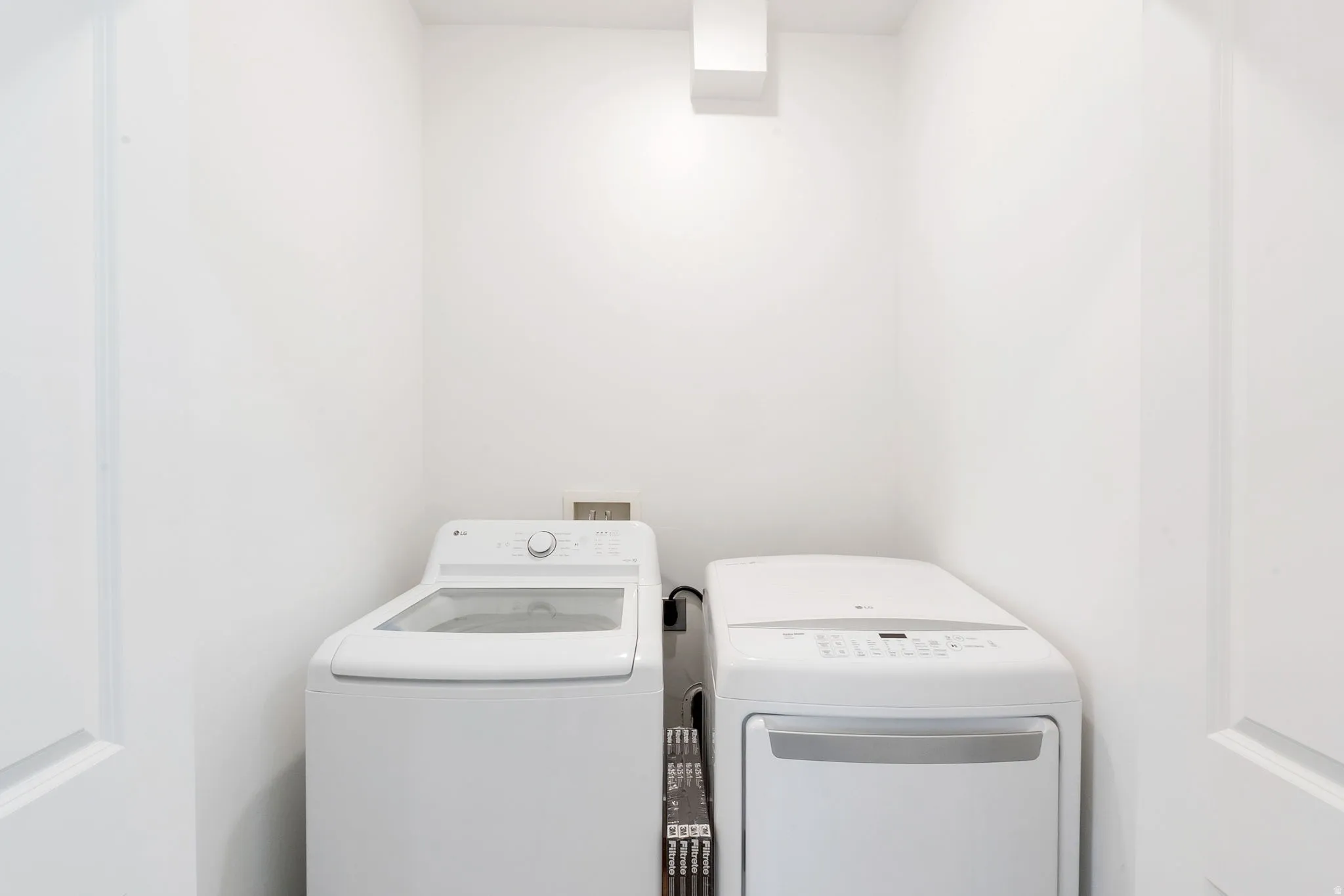 Dedicated laundry area with a washer and dryer