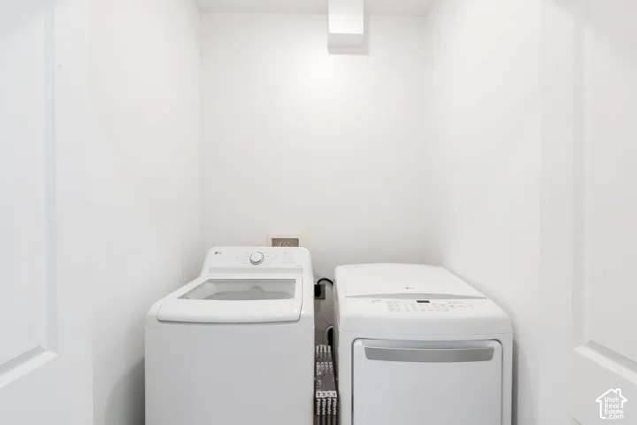 Dedicated laundry area with a washer and dryer