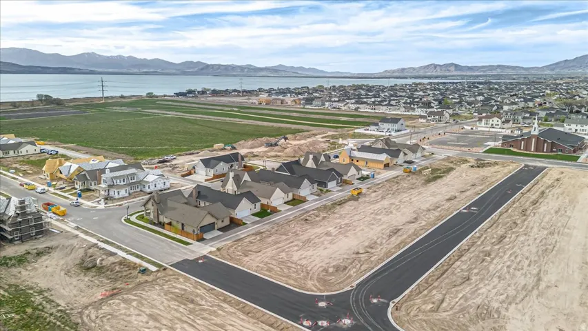 New residential development featuring a variety of single-family homes and asphalt roadways