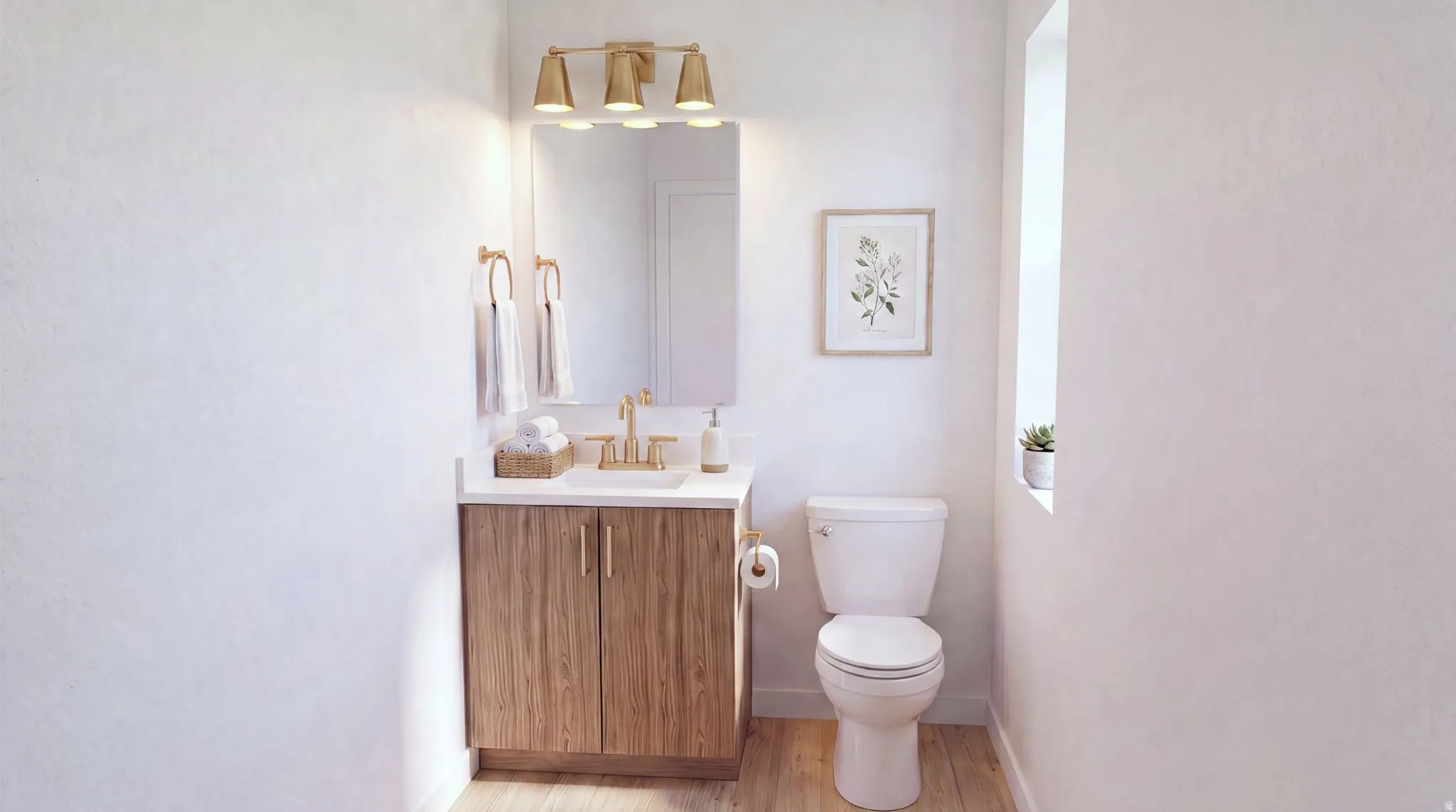 Vanity featuring wood-finish cabinetry, a white countertop, and gold-tone hardware