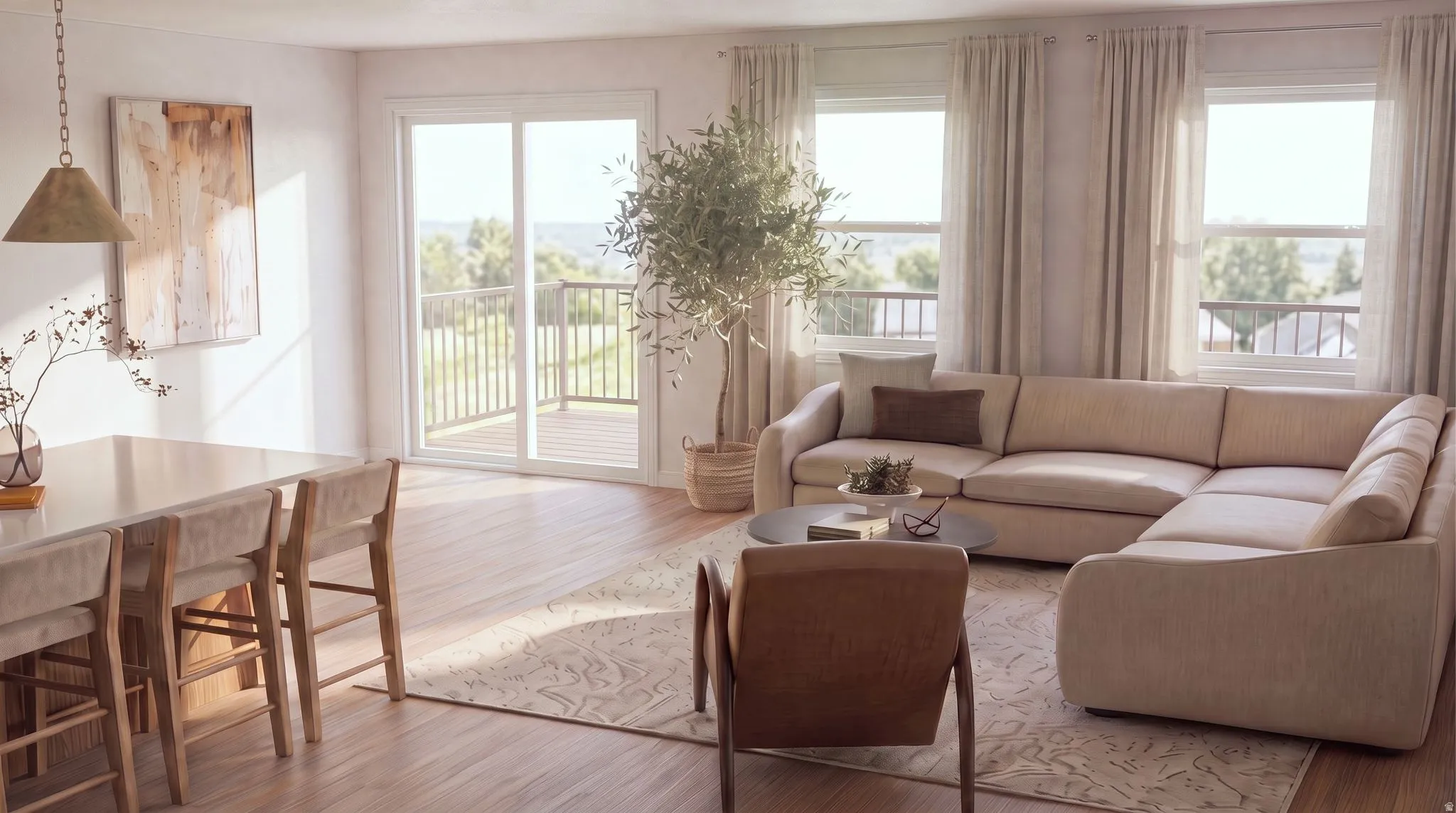 Open-concept living area featuring wood-finish flooring, a patio door leading to an outdoor deck, and multiple windows providing natural illumination