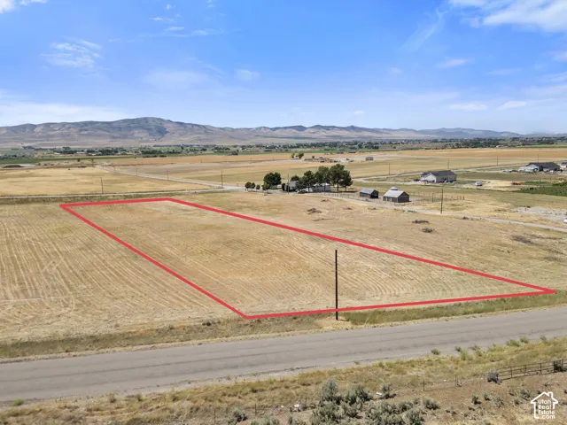 Expansive land parcel with surrounding agricultural fields