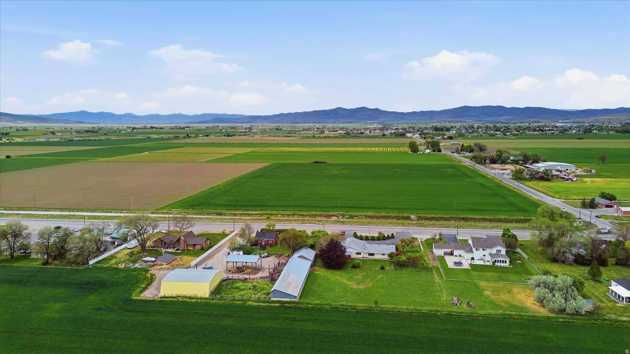 Agricultural land featuring a mix of cultivated fields and undeveloped open space