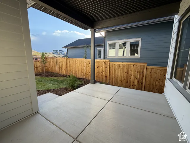 Covered patio with a concrete surface