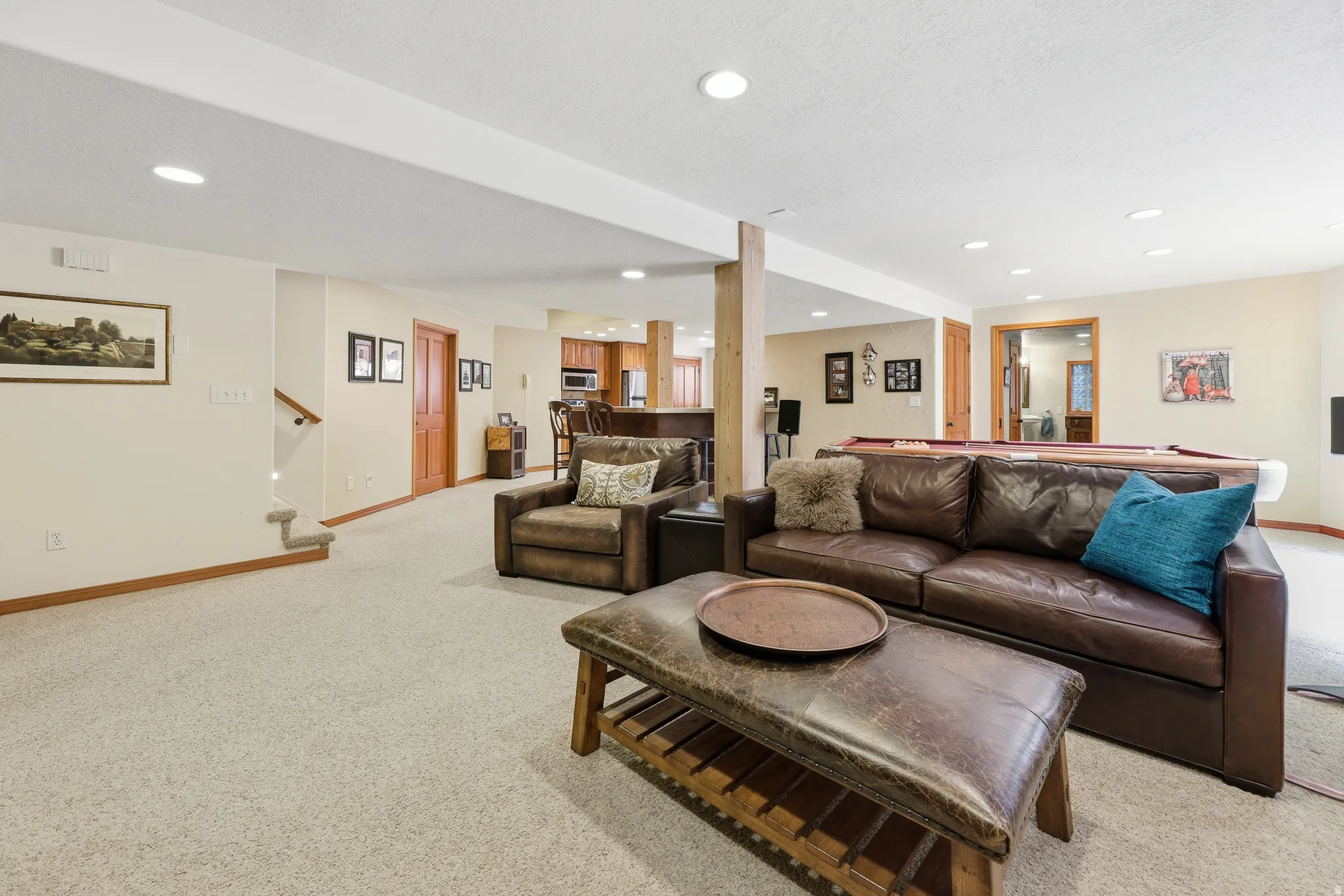 Spacious open floor plan living room / recreation room / kitchen