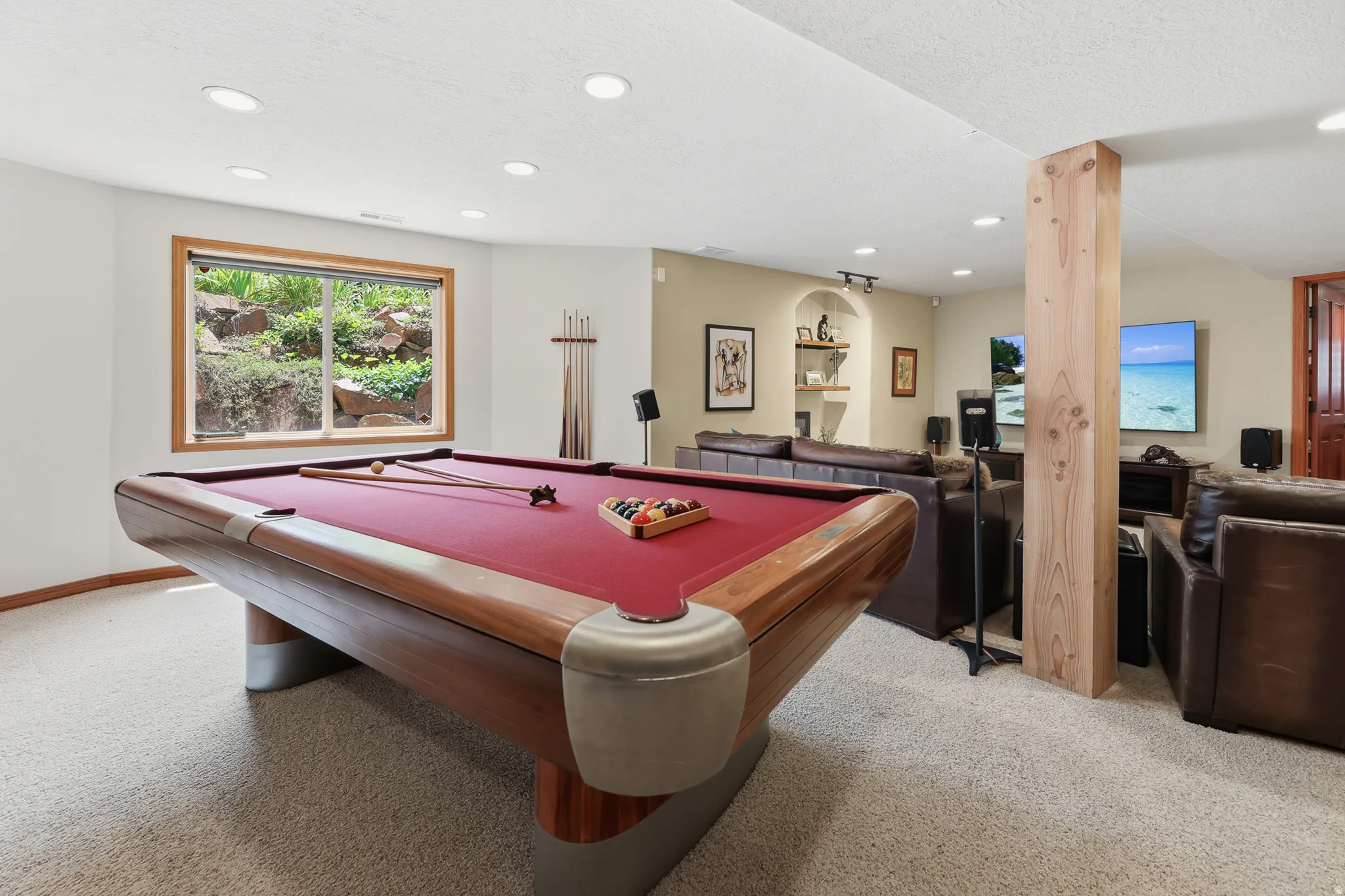 Spacious open floor plan living room / recreation room / kitchen