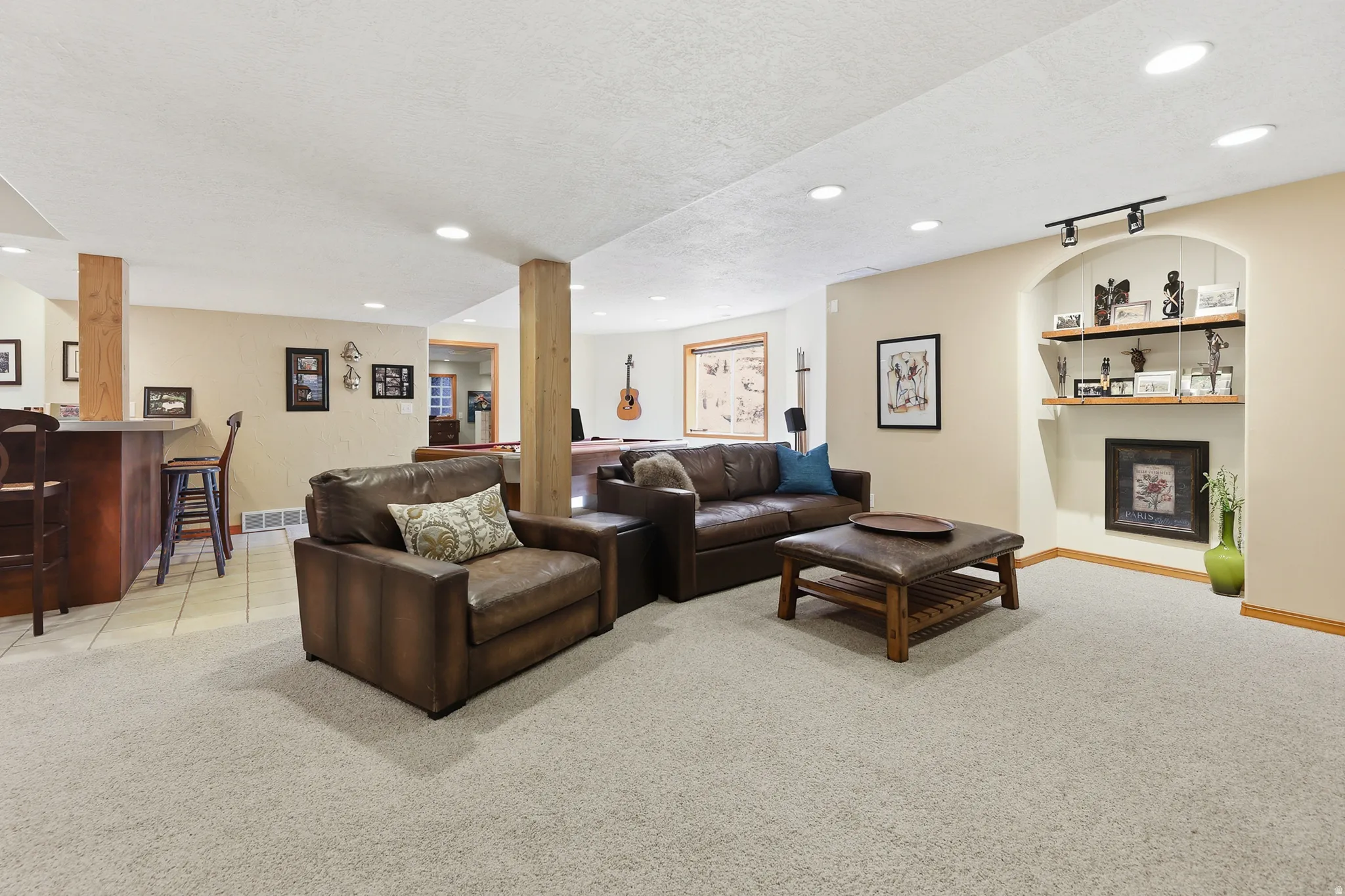 Spacious open floor plan living room / recreation room / kitchen