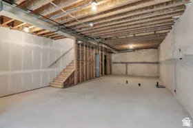 Unfinished basement provides opportunity for another bedroom, bath, and rec room
