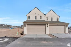 Rear entrance garage provides privacy