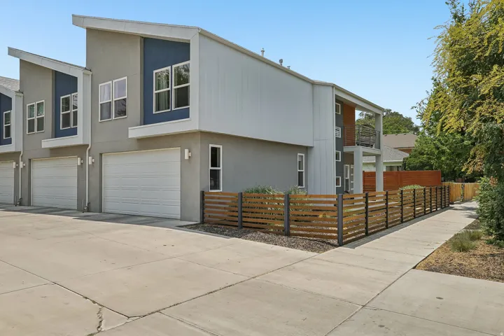 Contemporary multi-level exterior featuring a combination of stucco and horizontal siding