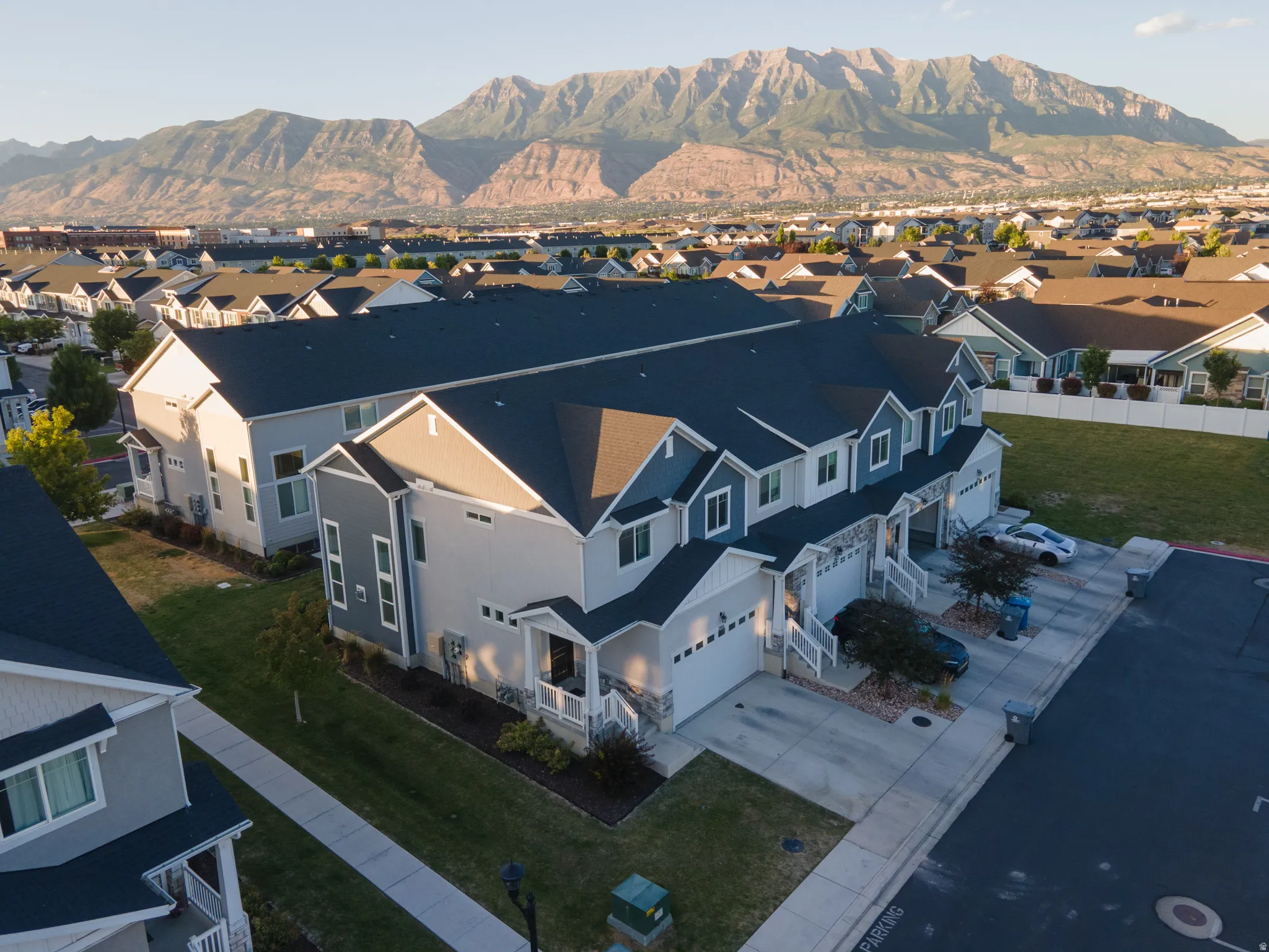 Modern townhouse development featuring multi-level designs and attached garages