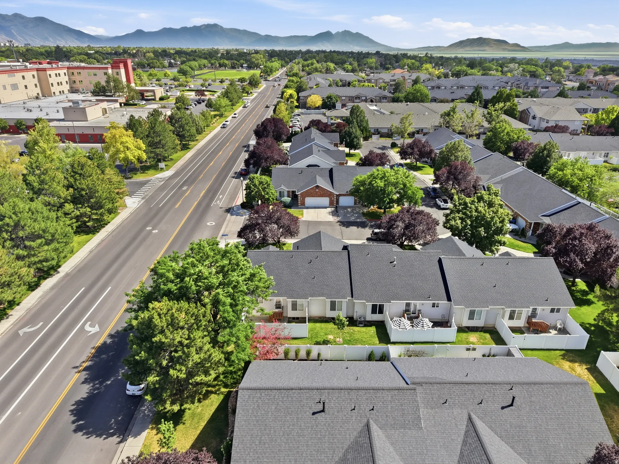 Aerial perspective showcasing a residential community with mature landscaping