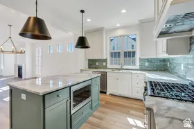 Large island provides extra prep space and has a built-in microwave