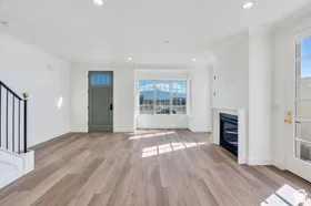 Spacious living room with fireplace and amazing views