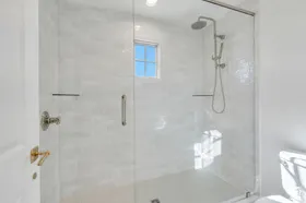 Beautiful master bath with walk-in shower and Euro-glass doors