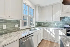 Gorgeous counters complement the backsplash
