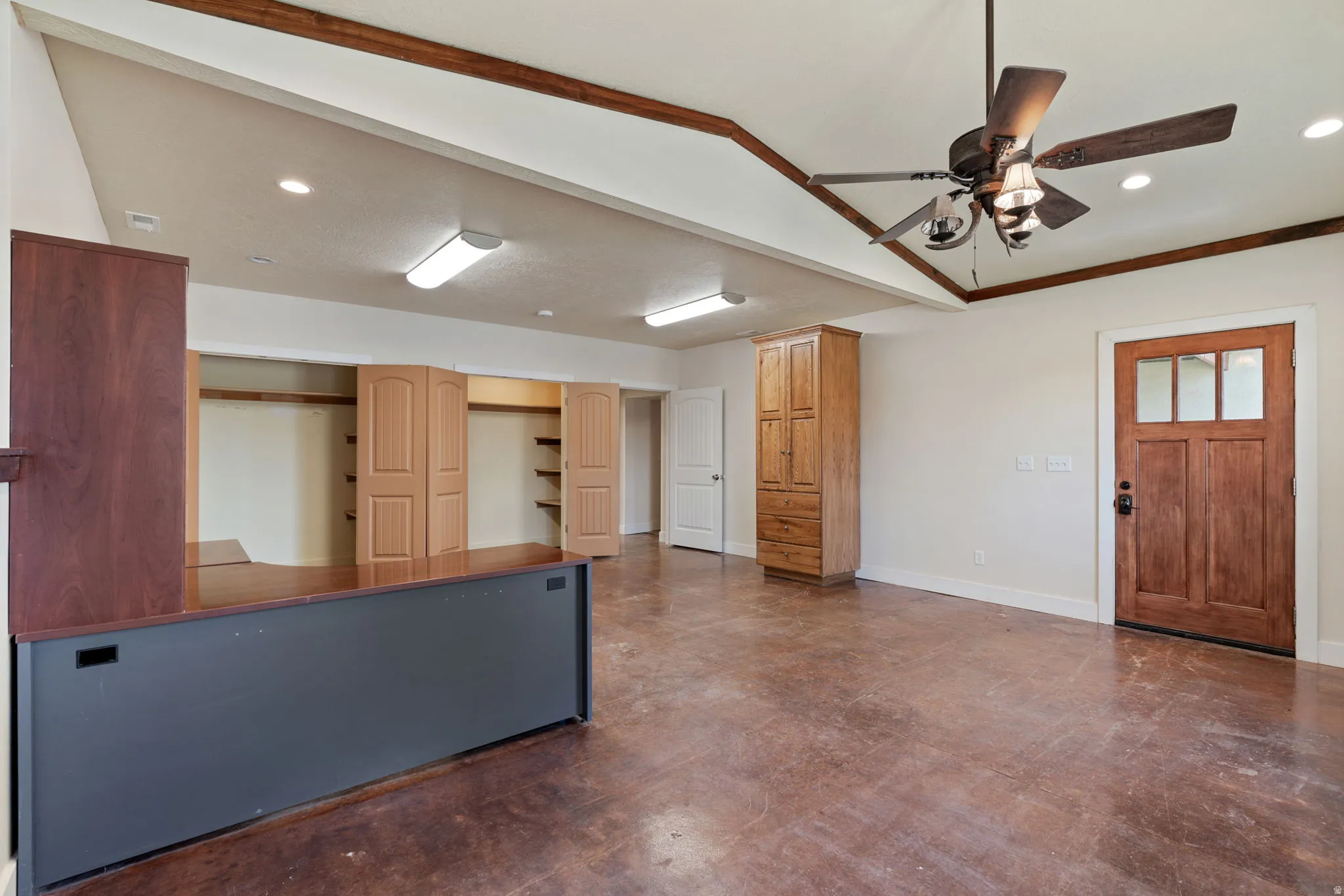 Huge office space/multipurpose area, just off the main entrance of the home. Easy for guests or clients to stop in without going through your home.