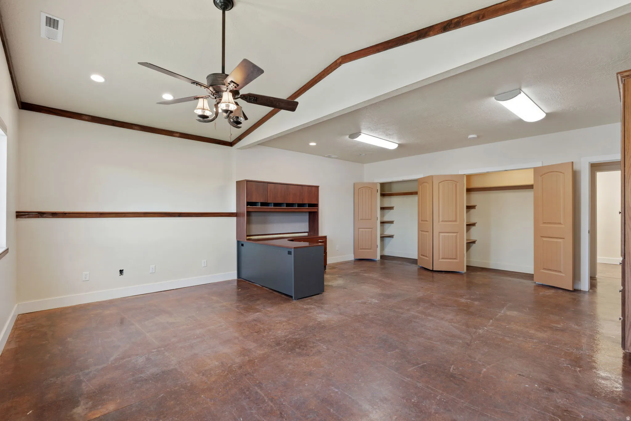 Huge office space/multipurpose area, just off the main entrance of the home. Easy for guests or clients to stop in without going through your home.