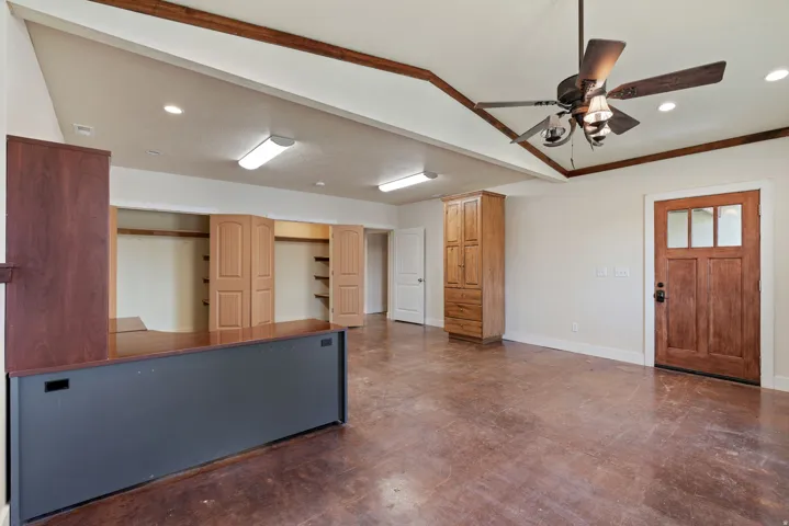 Huge office space/multipurpose area, just off the main entrance of the home. Easy for guests or clients to stop in without going through your home.