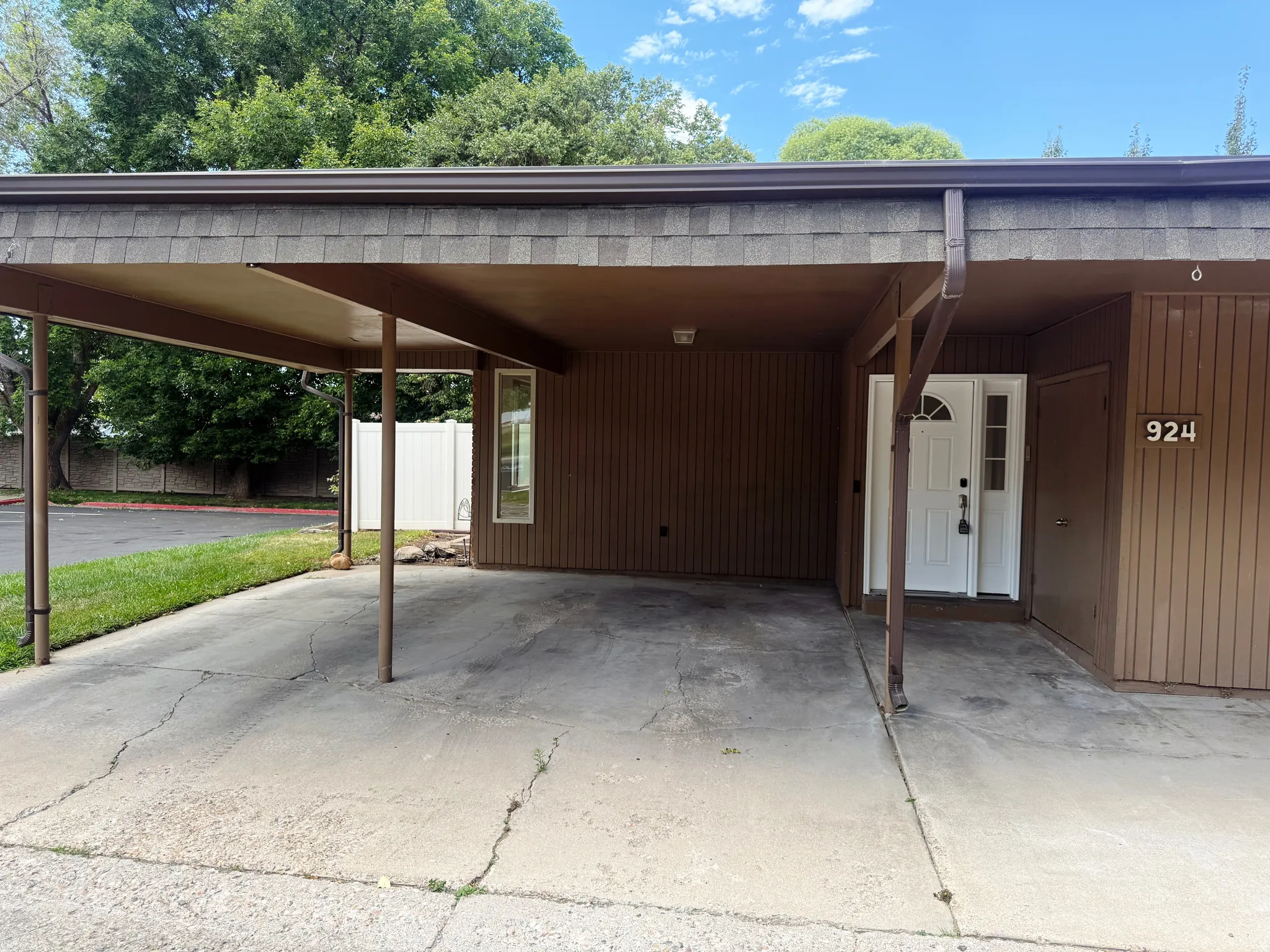Covered carport providing sheltered parking