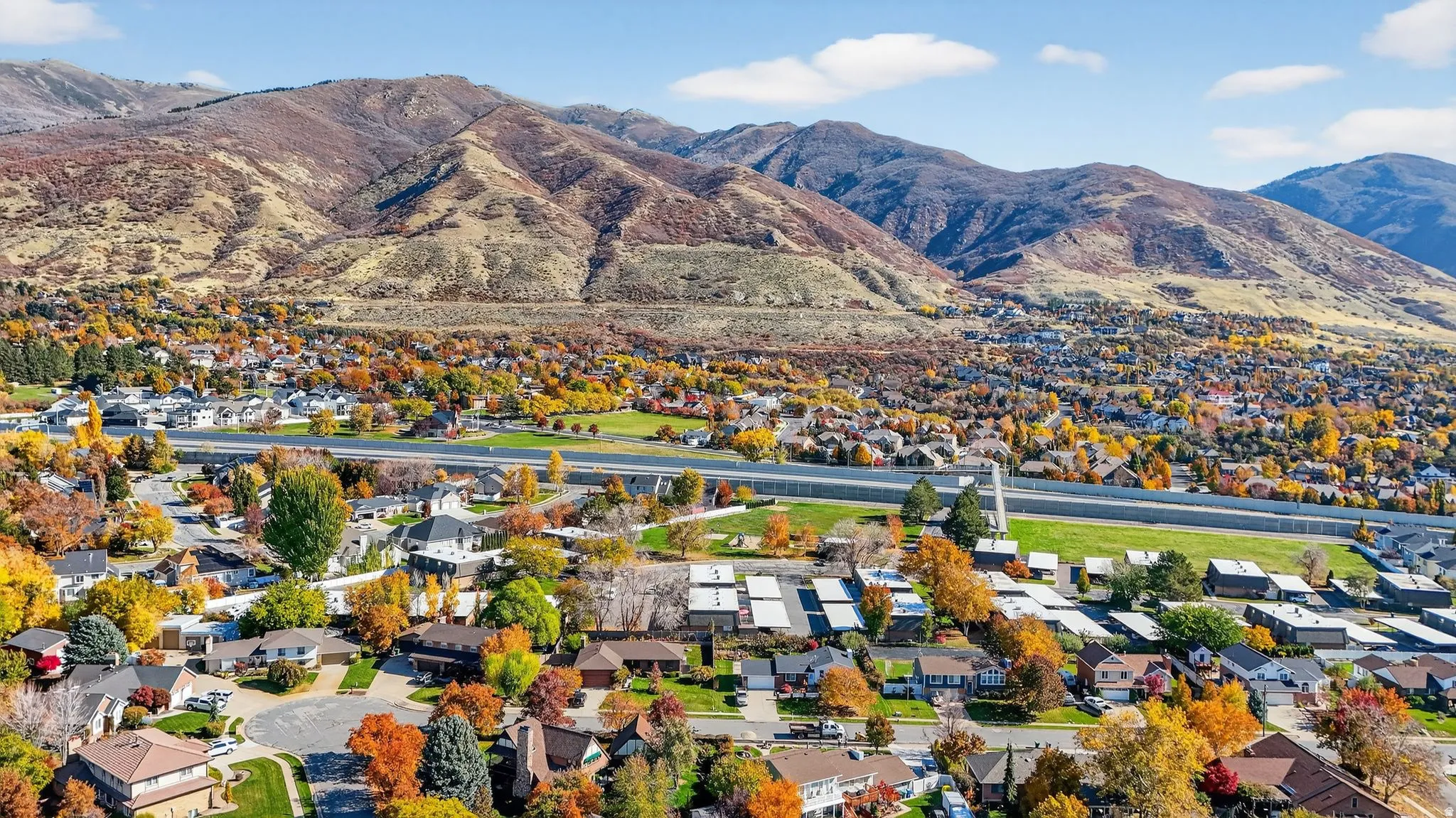 Residential community set against a backdrop of mountains