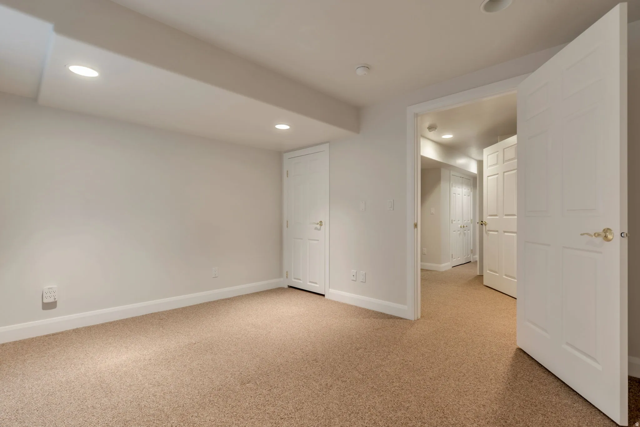 guest bedroom with walk in closet