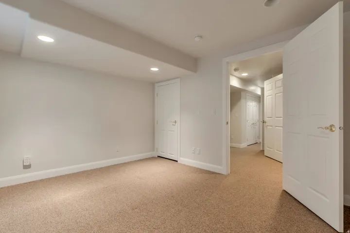 guest bedroom with walk in closet