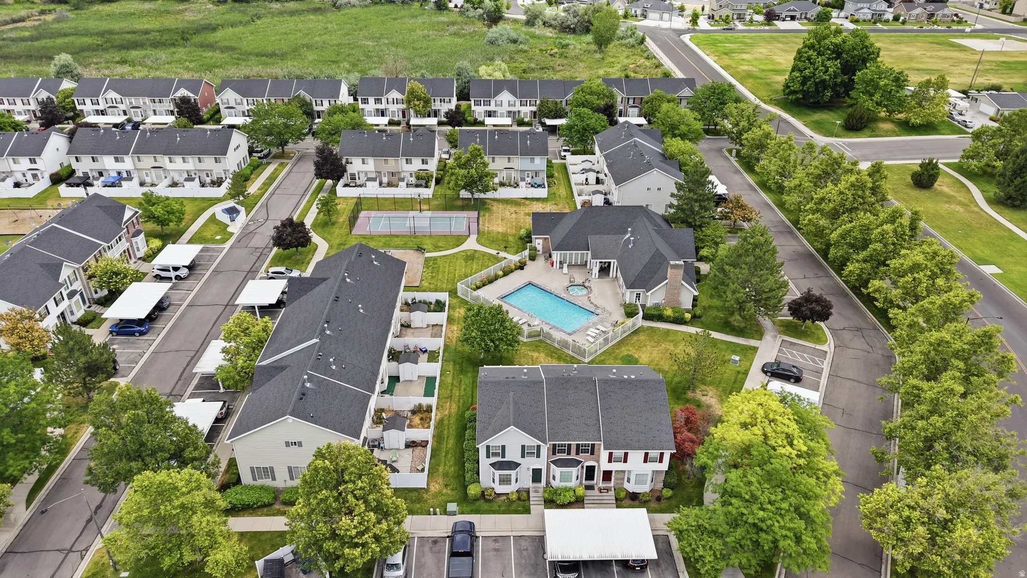 Expansive residential community featuring townhomes, apartment-style buildings, and multi-level residences