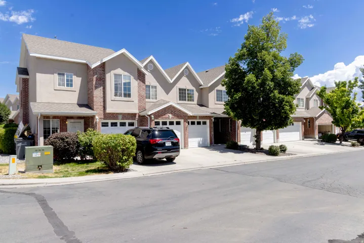 Townhome with 2 car garage and 2 parking spaces.