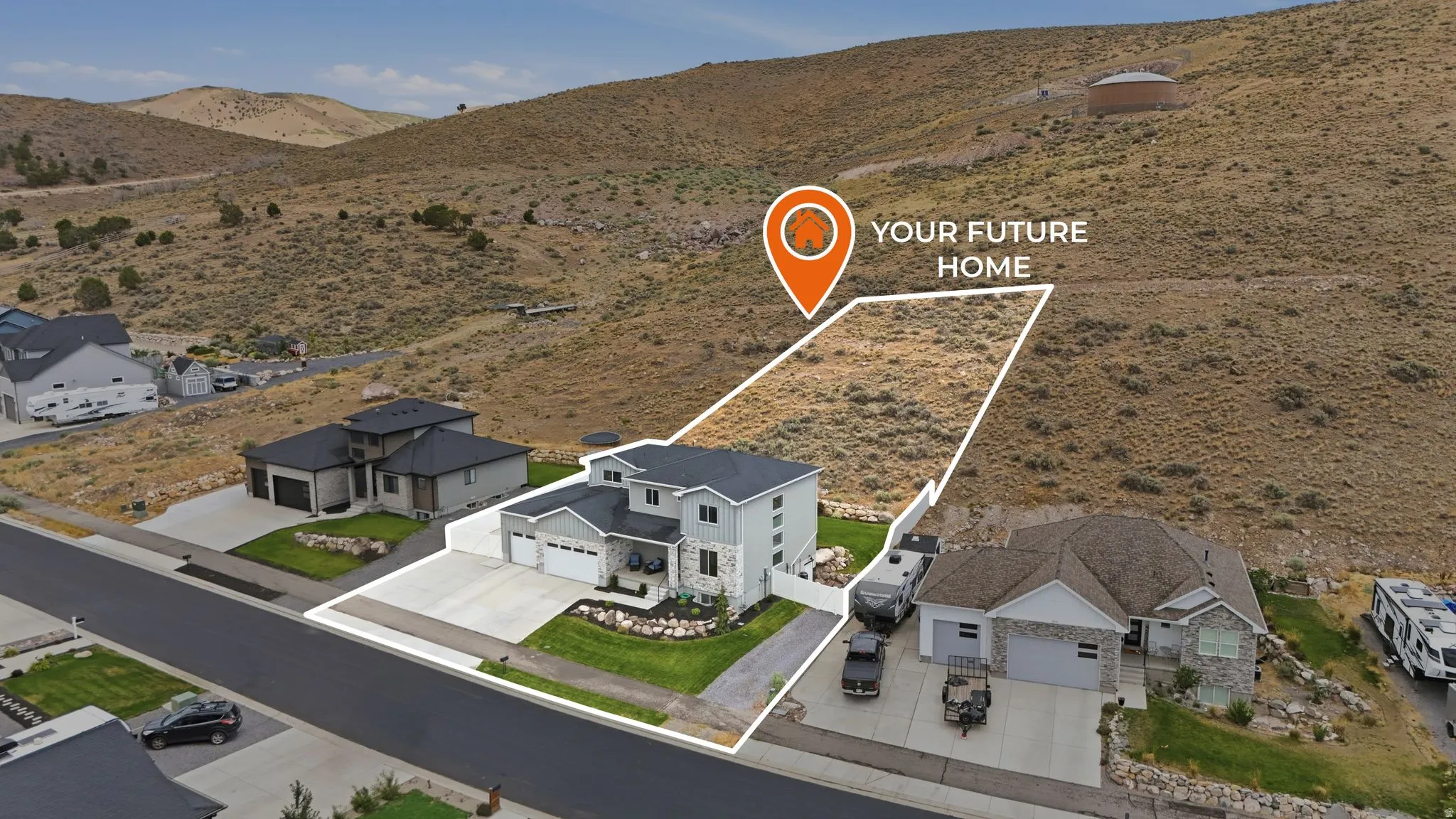 Expansive residential lot with surrounding mountain terrain