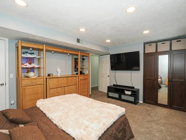 Recessed lighting illuminates the ceiling